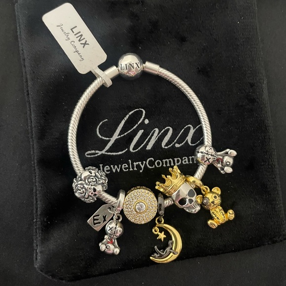 Linx Jewelry Linx Snake Chain Bracelet With Gold And Silver Skull